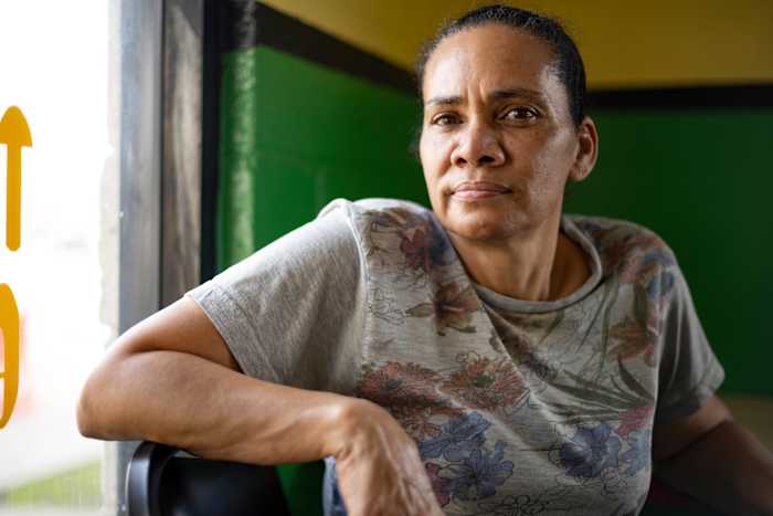 Sandra Estrada now finds that her restaurant is empty on Sundays, despite the crush of football fans who come into town.